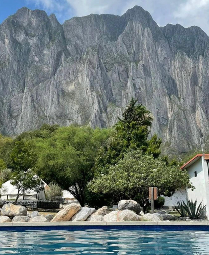 Pool area La Posa with El Potrero Chico in the background