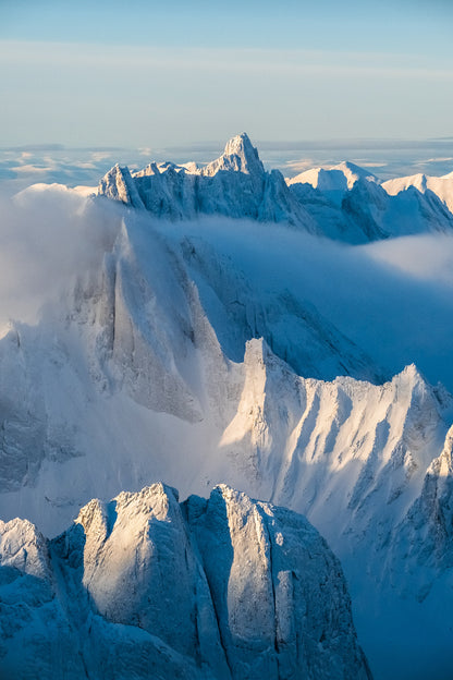 Snow-covered mountain peaks Tombstone Territorial Park Yukon with a clear sky