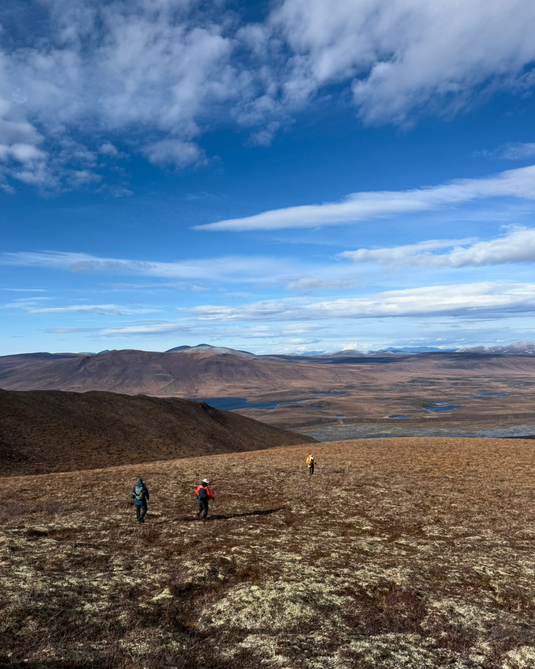 Hikers on tundra Vines Mountain Tombstone Yukon